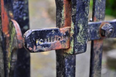 Blacksmith’s marking with the inscription ‘Callaghan’ on latch of forge made gates at Martry Graveyard. These gates were made by Henry Callaghan, a blacksmith at Connell’s Forge Ongenstown, Bohermeen. These gates were yard gates in Martry and were rehung on the extension to Martry Graveyard in recent years. Many blacksmiths branded their work in some way. (photo by Eleanor Tallon)